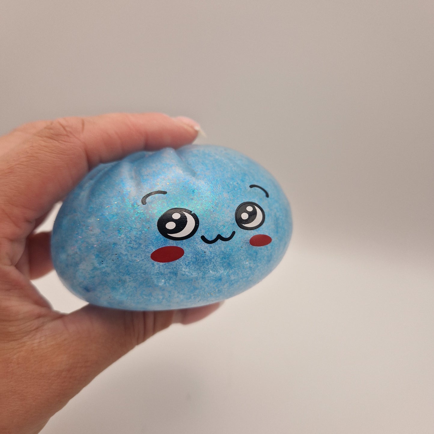 Orb filled squishy dumpling