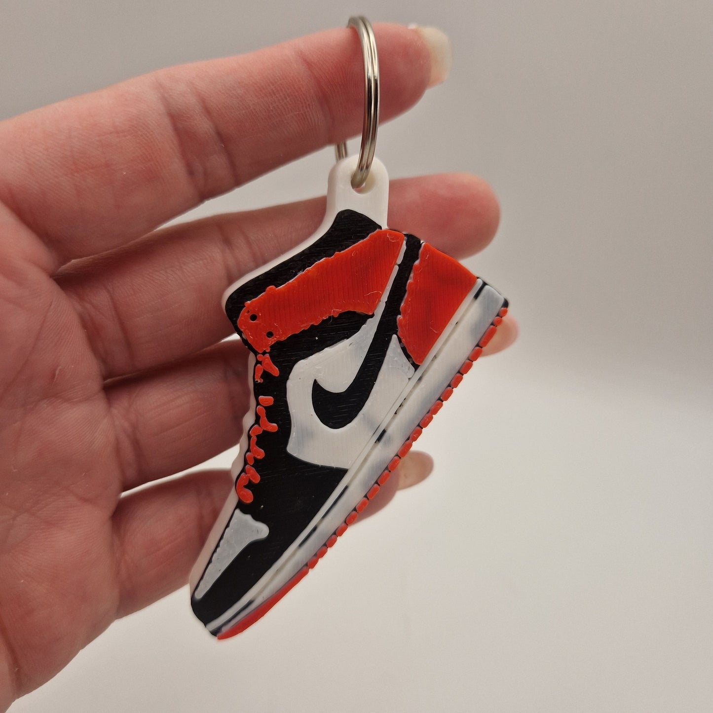 Nike keyring can opener