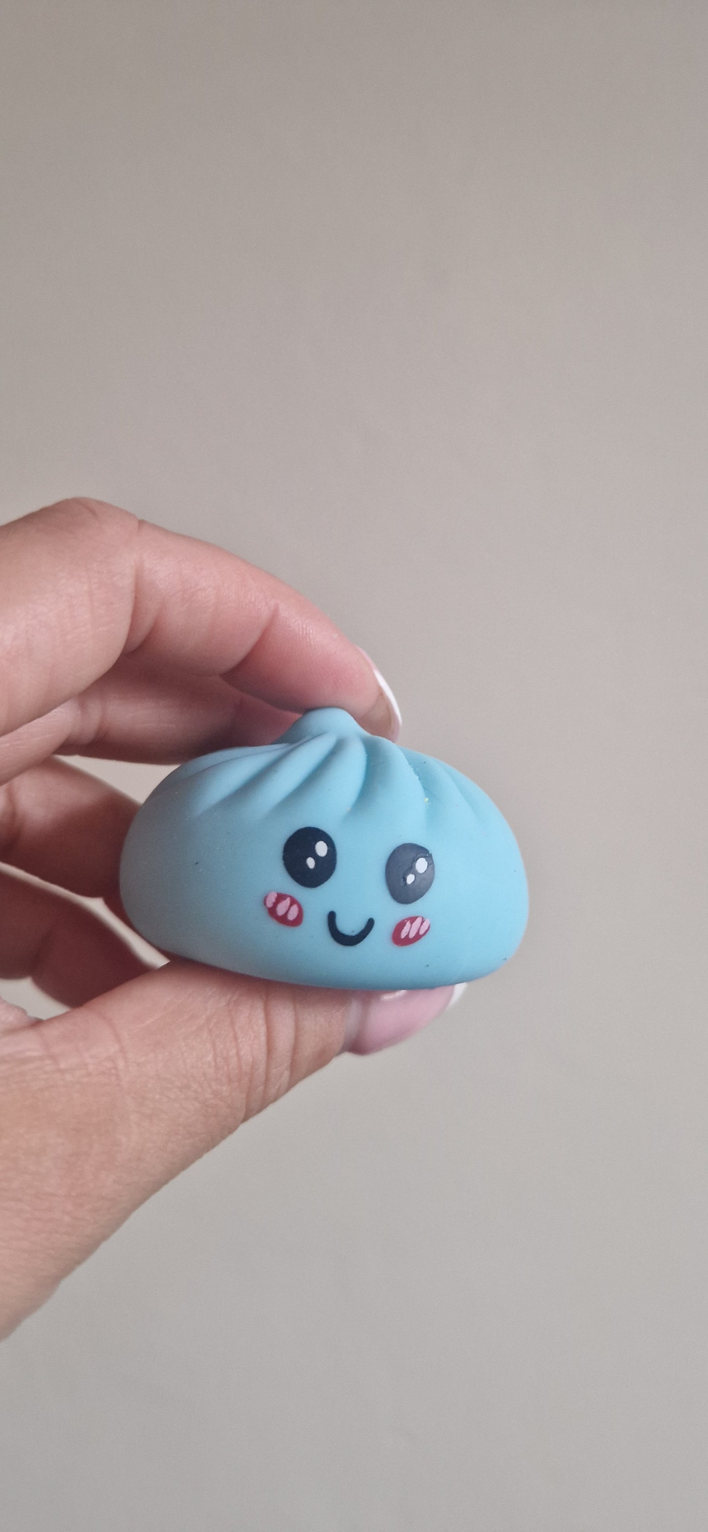 Kawaii squishy bao bun in steamer basket