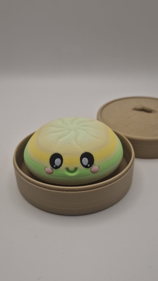 3D printed large dumpling clickers in basket.