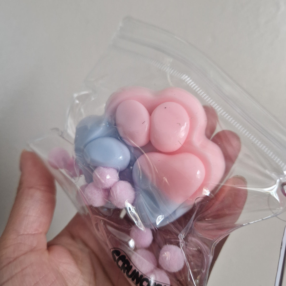 Scrunchems sticky squishy paw prints